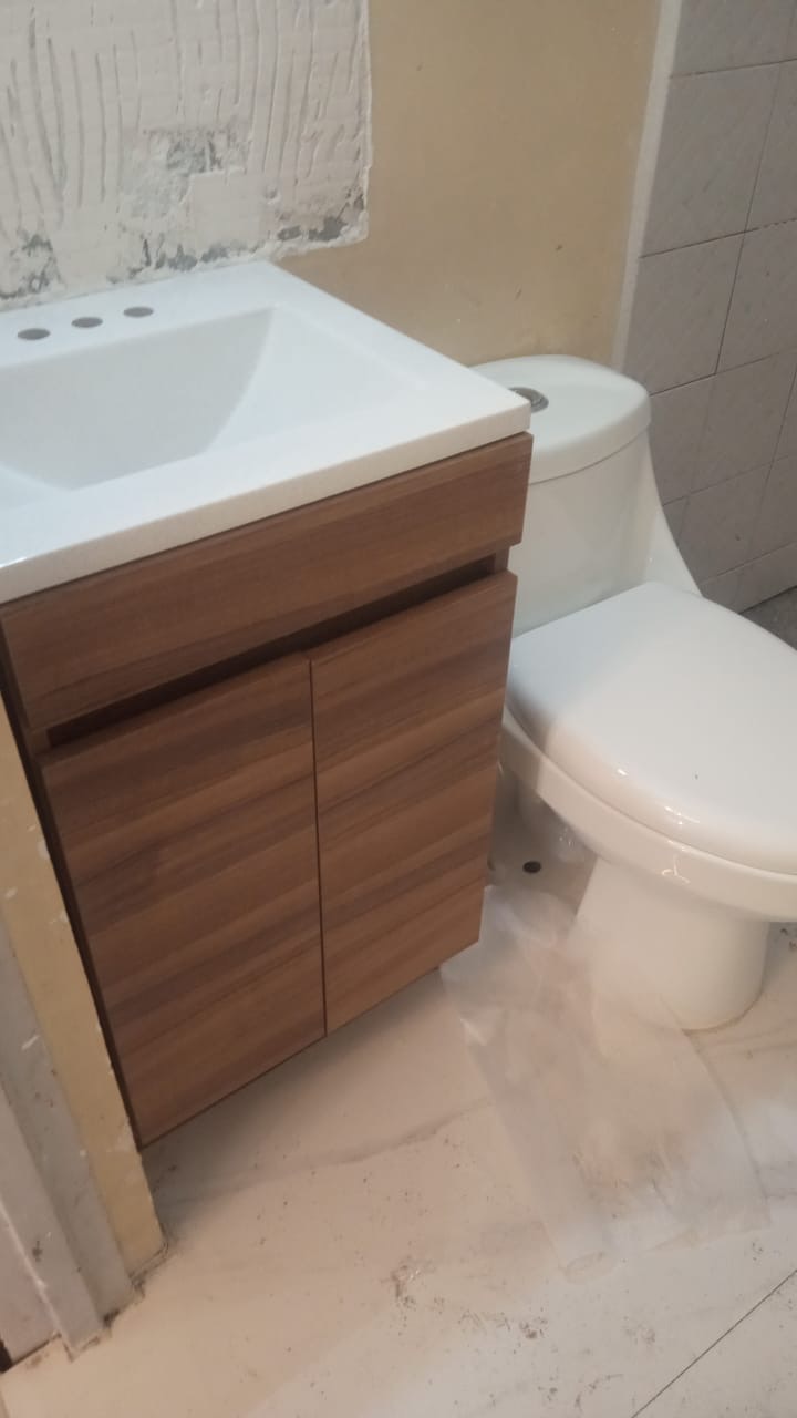 Lavabo con mueble y sanitario